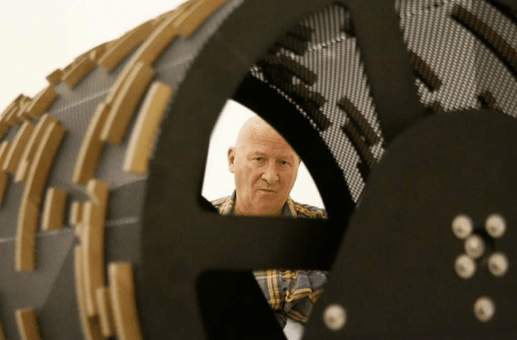 GB looking into mechanical music box:drum
